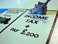 income tax monopoly
